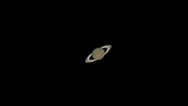 Photo of Saturn using Dobsonian Telescope photo credit Chris Isherwood