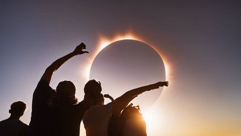 people enjoying the corona during a total solar eclipse